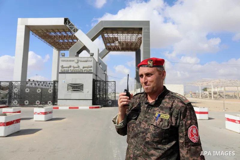 Members of Palestinan security forces stand guard at the closed down Rafah border crossing to Egypt in the southern Gaza Strip, on August 23, 2021. Egypt has told Gaza authorities it will close the Rafah border crossing...