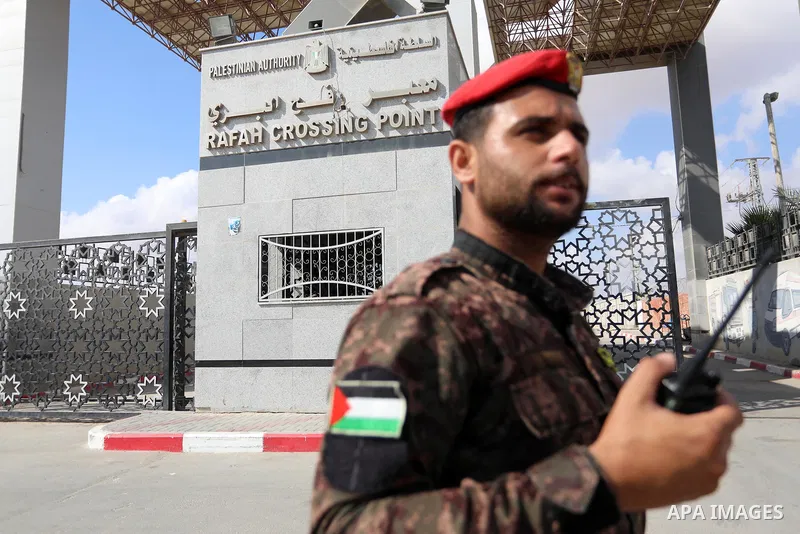 Members of Palestinan security forces stand guard at the closed down Rafah border crossing to Egypt in the southern Gaza Strip, on August 23, 2021. Egypt has told Gaza authorities it will close the Rafah border crossing...