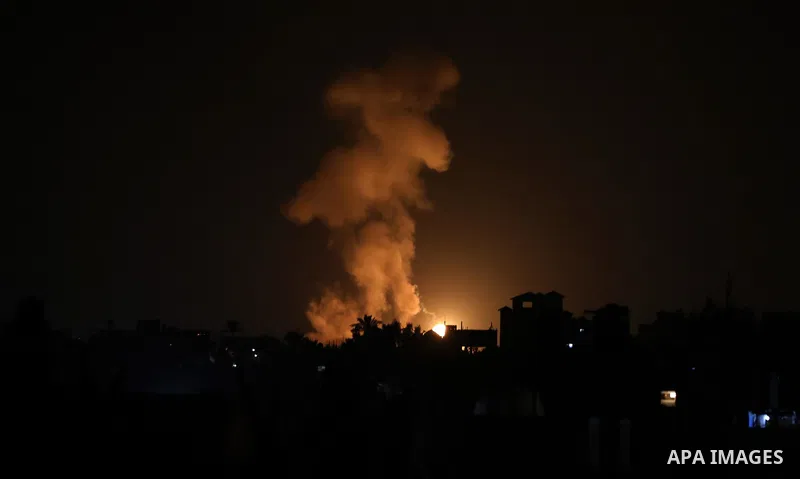 A fireball rises following an Israel air strike in Khan Yunis in the southern Gaza Strip, late on August 23, 2021. Israel launched airstrikes against Gaza, a source inside the enclave said, after incendiary balloons laun...