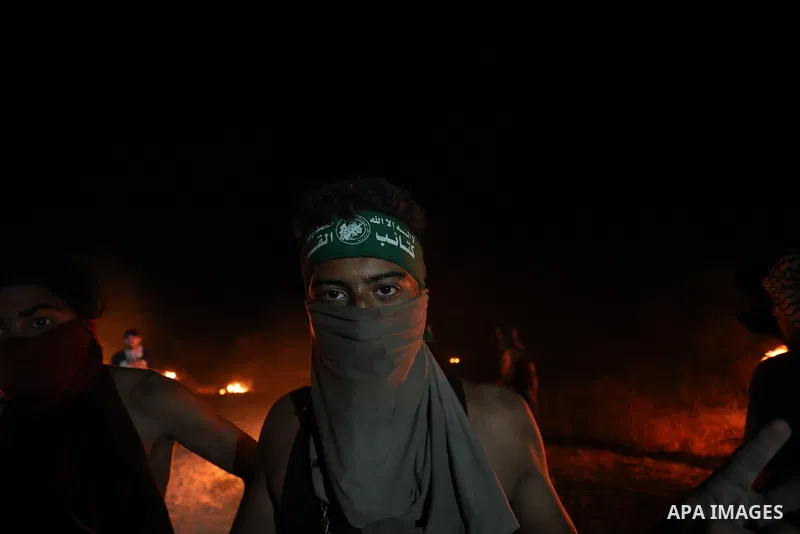 Members of Palestinian protesters calling themselves the "night confusion units", burns tires as they gather near the Gaza-Israel border east of Gaza city, August 28, 2019. Hundreds of Palestinian protesters, have been o...