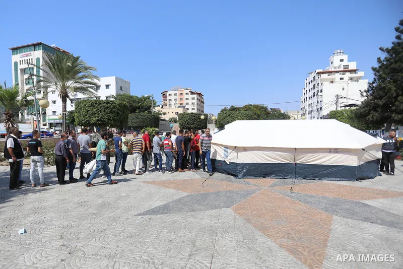 Palestinians get inoculated with a dose of the Covishield vaccine against the Covid-19 coronavirus, at a temporary vaccination centre set up, in Gaza city on August 29, 2021. Palestine Ministry of Health said that 196254...