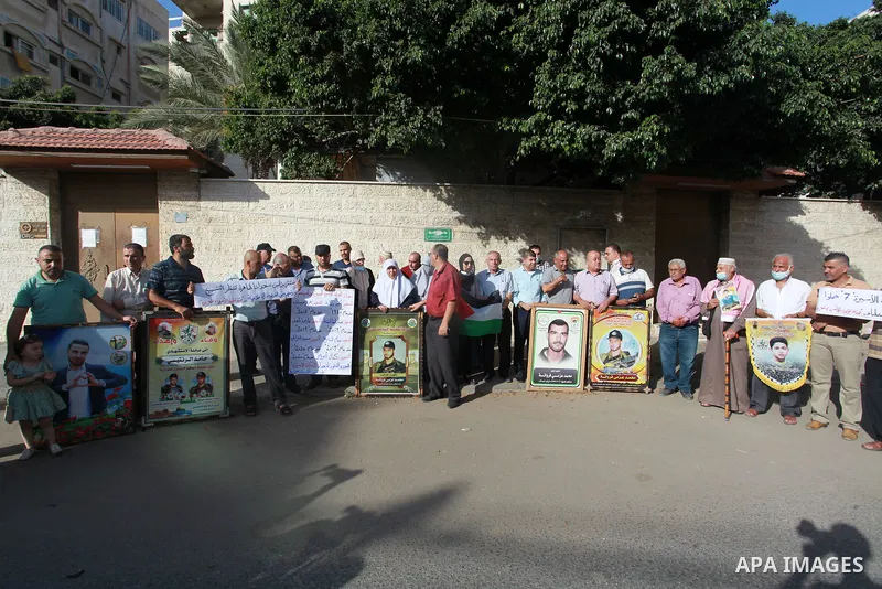 Palestinians take part in a rally demanding to return the bodies of Palestinians who killed by Israeli army and detained them, in front of Red Cross office in Gaza city, on August 29, 2021. Palestinians mark the National...