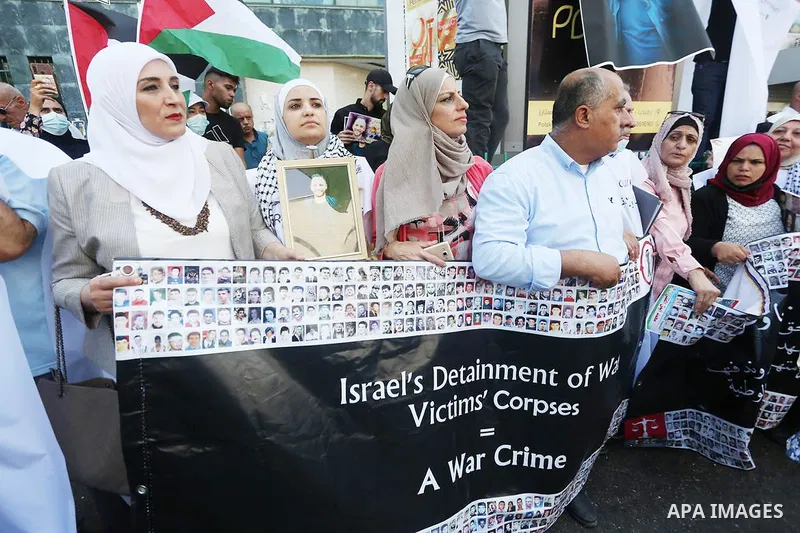 Palestinians take part in a rally demanding to return the bodies of Palestinians who killed by Israeli army and detained them, in the West Bank city of Nablus, on August 29, 2021. Palestinians mark the National Day for t...