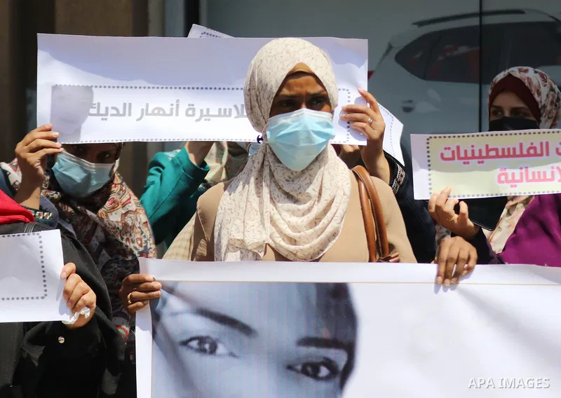 Palestinian women take part in a protest to show solidarity with prisoner Anhar al-Deek, in Gaza city, on September 02, 2021. Anhar al-Deek, a 25-year-old Palestinian prisoner, is getting closer to giving birth in an Isr...