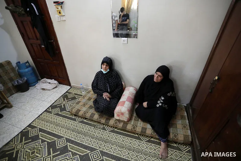 Mourners attend the funeral of Palestinian Ahmed Saleh, who was shot dead by Israeli troops during night clashes the Israeli-Gaza border fence, at Jabalia refugee camp northern Gaza Strip on September 3, 2021. Photo by A...