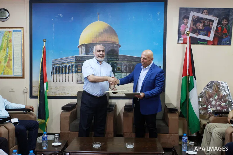 Palestinians attend the signing ceremony of the "Basmat Amal" project agreement for disabled, in Gaza city, on September 5, 2021. Almost 50,000 Palestinians are classified as "disabled" among the 2-million population of...