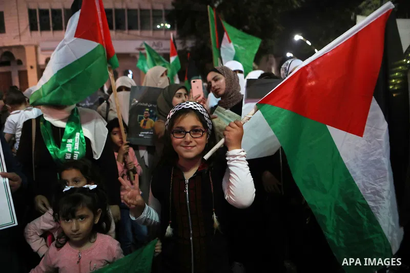 Palestinians take part in a rally as they celebrate the escape of six Palestinians from an Israeli prison, in the West Bank city of Hebron, on September 6, 2021. - Six Palestinians broke out of a prison in northern Israe...