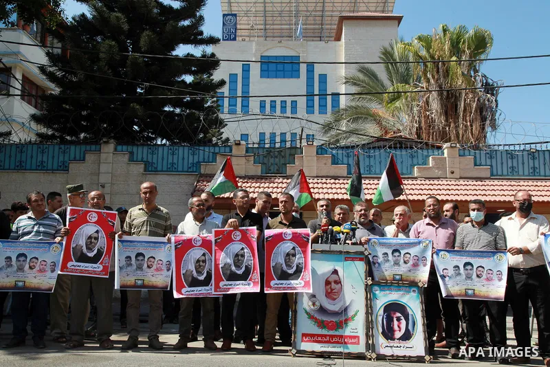Palestinians take part in a protest to show solidarity with prisoner Israa Al-Jaabis helds in Israeli Jails, in front of the headquarters of the High Commissioner, in Gaza city on September 8, 2021. Israa Jaabis, a 36-ye...