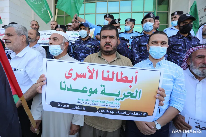Palestinians take part in a protest to show solidarity with prisoners held in Israeli Jails, in Khan Younis in the southern of Gaza strip, on September 8, 2021. In a step seen as vengeance following the escape yesterday...