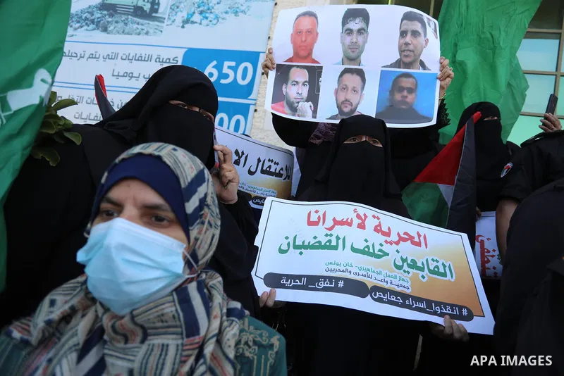 Palestinians take part in a protest to show solidarity with prisoners held in Israeli Jails, in Khan Younis in the southern of Gaza strip, on September 8, 2021. In a step seen as vengeance following the escape yesterday...