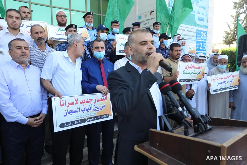 Palestinians take part in a protest to show solidarity with prisoners held in Israeli Jails, in Khan Younis in the southern of Gaza strip, on September 8, 2021. In a step seen as vengeance following the escape yesterday...