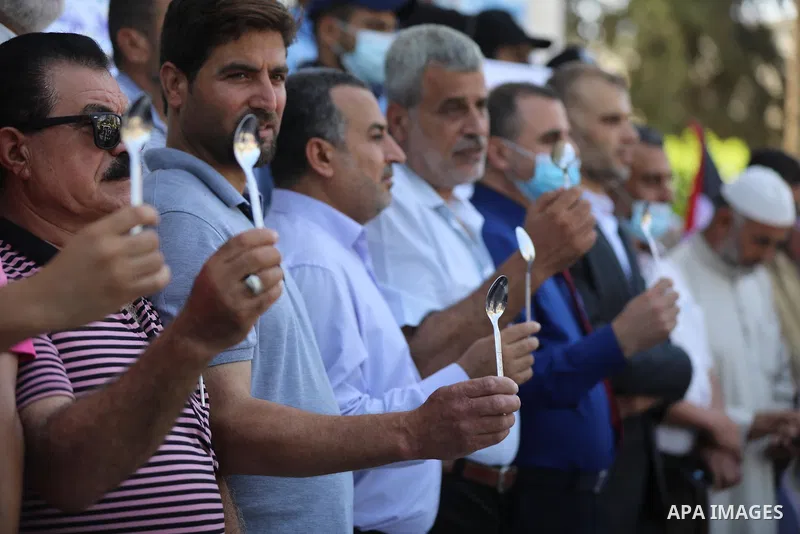 Palestinians take part in a protest to show solidarity with prisoners held in Israeli Jails, in Khan Younis in the southern of Gaza strip, on September 8, 2021. In a step seen as vengeance following the escape yesterday...