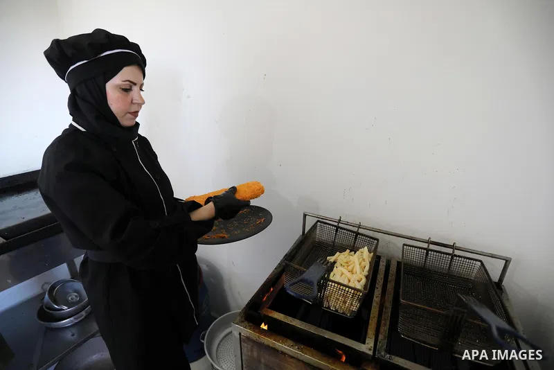 Two female Palestinian graduates, Heba Al-Hallaq, 32, and Heba Al Qudra, 22, open their own restaurant, to face unemployment in Khan Younis in the southern Gaza strip, on September 8, 2021. Gaza’s 2-million population re...