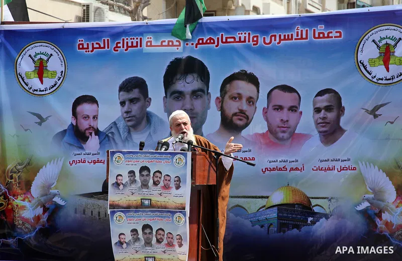 Palestinians attend Friday prayer in solidarity with prisoners in Israeli jails, in front of Red cross office, in Gaza city, on September 10, 2021. Israeli troops have arrested at least six family members in the West Ban...