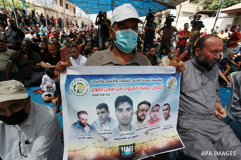 Palestinians attend Friday prayer in solidarity with prisoners in Israeli jails, in front of Red cross office, in Gaza city, on September 10, 2021. Israeli troops have arrested at least six family members in the West Ban...