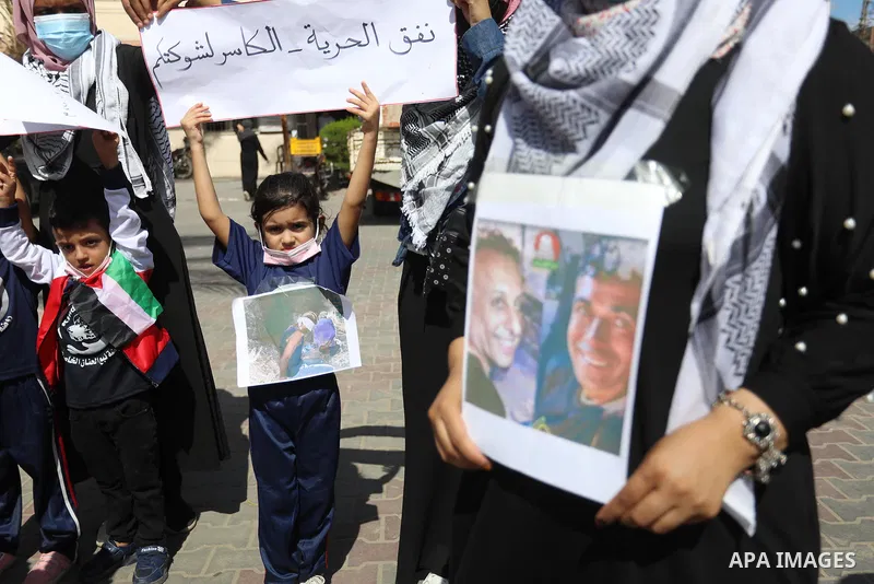 Palestinian children take part in a protest following the arrest of 4 of 6 fugitives from Gilboa jailbreak now in Israeli custody, in Deir Al-Balah in the center of Gaza strip, on 11 Sebtember 2021. Two more of the six G...