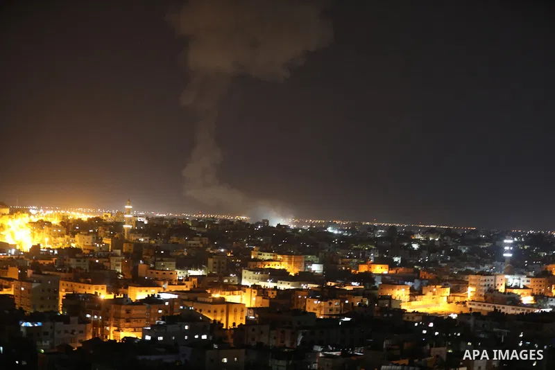 A fireball rises following an Israel air strike in Khan Yunis in the southern Gaza Strip, late on September 13, 2021. Israel launched airstrikes against Gaza, a source inside the enclave said. Photo by Ashraf Amra