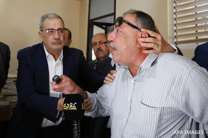 Members of the revolutionary council of the Fatah movement visit the family of the Palestinian Zakaria Zubeidi, who was arrested following his escape from Gilboa prison in the West Bank city of Jenin on September 13, 202...