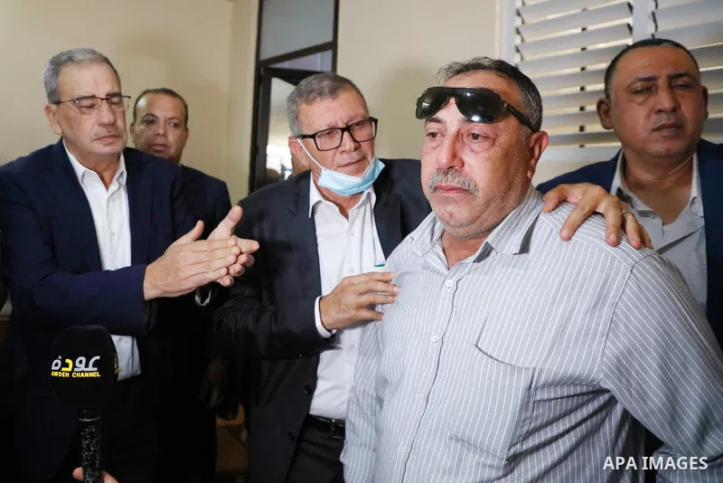 Members of the revolutionary council of the Fatah movement visit the family of the Palestinian Zakaria Zubeidi, who was arrested following his escape from Gilboa prison in the West Bank city of Jenin on September 13, 202...