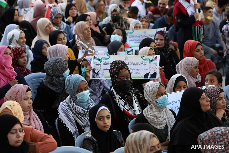 Palestinians take part in a protest against the United States and UNRWA signing a Framework for Cooperation, in Gaza city on September 14, 2021. The Framework for Cooperation states, “The US will not make any contributio...
