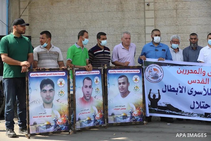 Palestinians take part in a protest to solidarity with prisoners held in Israeli jalis, in front of the headquarters of the High Commissioner, in Gaza city on September 21 2021. There are around 4,850 Palestinian detaine...