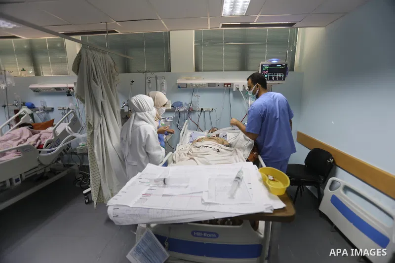 Palestinian patient infected with Coronavirus receives medical care at European Gaza Hospital in Rafah in the southern of Gaza Strip, on September 21, 2021. Fourteen people have died of coronavirus in Palestine in the la...