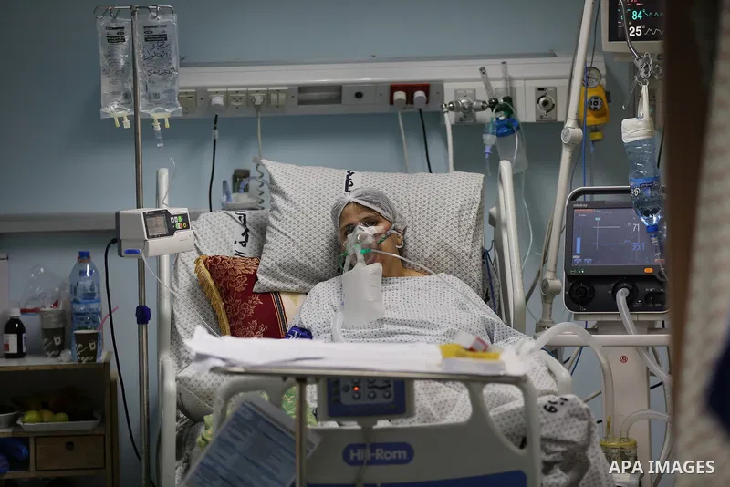 Palestinian patient infected with Coronavirus receives medical care at European Gaza Hospital in Rafah in the southern of Gaza Strip, on September 21, 2021. Fourteen people have died of coronavirus in Palestine in the la...