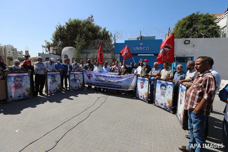 Palestinians take part in a protest to show solidarity with prisoners in Israeli Jails, in front of the UNESCO headquarters in Gaza city, on Sebtember 26, 2021. Palestinian administrative detainees believe hunger strike...