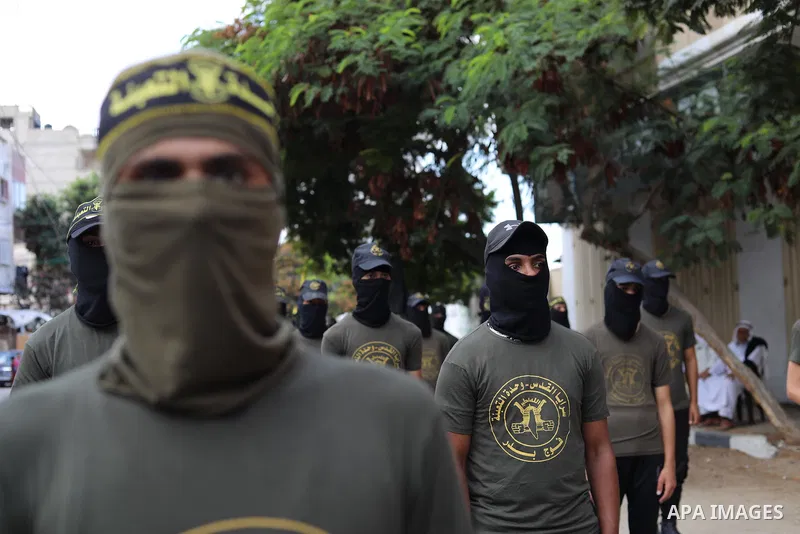 Members of the Palestinian Islamic Jihad movement march in solidarity with prisoners in Israeli Jails, in front of Red cross office in Khan Younis in the southern of Gaza strip, on Sebtember 27, 2021. Palestinian adminis...