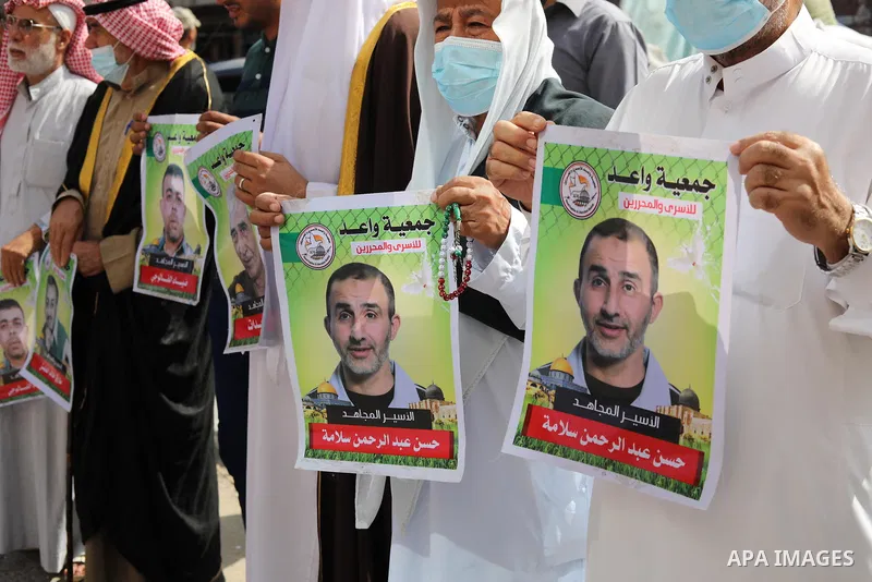 Members of the Palestinian Islamic Jihad movement march in solidarity with prisoners in Israeli Jails, in front of Red cross office in Khan Younis in the southern of Gaza strip, on Sebtember 27, 2021. Palestinian adminis...