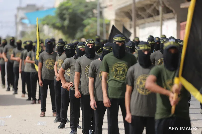 Members of the Palestinian Islamic Jihad movement march in solidarity with prisoners in Israeli Jails, in front of Red cross office in Khan Younis in the southern of Gaza strip, on Sebtember 27, 2021. Palestinian adminis...
