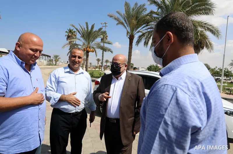Essam Aldalis, a member of the political bureau of Hamas, waits to cross into Egypt through the Rafah border crossing, in Rafah in the southern of Gaza Strip, on October 03, 2021. The Hamas delegation are preparing to le...