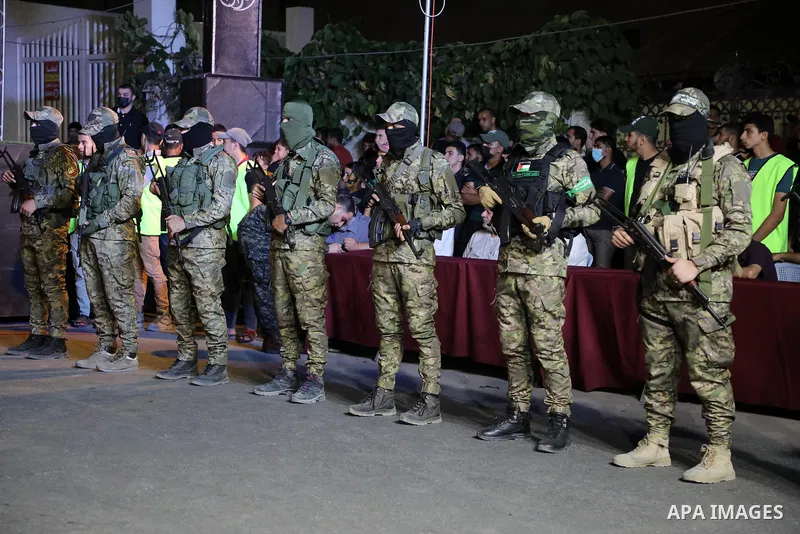 Members of the Izz al-Din al-Qassam Brigades, the military wing of Hamas movement, attend a memorial service for the Palestinians who were killed in the West Bank and Jerusalem by the Israeli army, in Gaza city on Octobe...