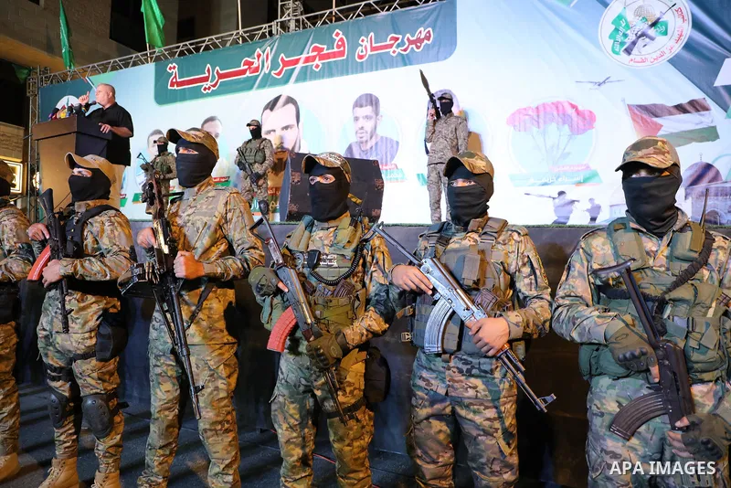 Members of the Izz al-Din al-Qassam Brigades, the military wing of Hamas movement, attend a memorial service for the Palestinians who were killed in the West Bank and Jerusalem by the Israeli army, in Gaza city on Octobe...