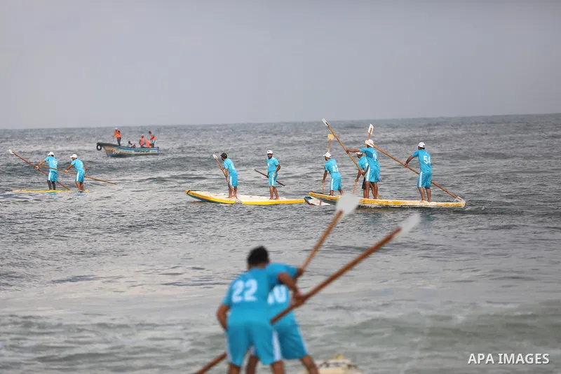 Palestinian players take part in the first sailing and rowing championship on the shore of the Mediterranean, in Gaza city, on Ocotber 20, 2021. The Palestinian Sailing and Rowing Federation organized the first sailing a...