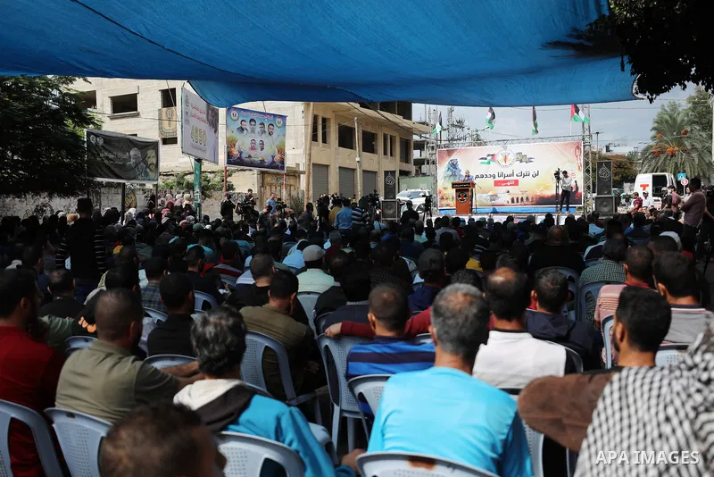 Palestinians take part in a protest to show solidarity with prisoners in Israeli Jalis, in front of Red cross office in Gaza city, on October 20, 2021. The Palestinian Prisoner Society (PPS) said in a press release that...