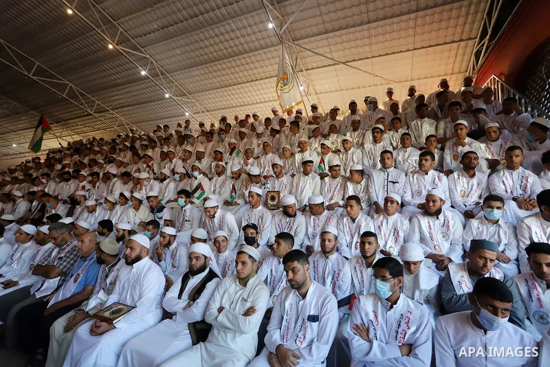 Palestinians participate in a ceremony to honor the memorizers of the Holy Koran, in Gaza city on October 26, 2021. Photo by Omar Ashtawy