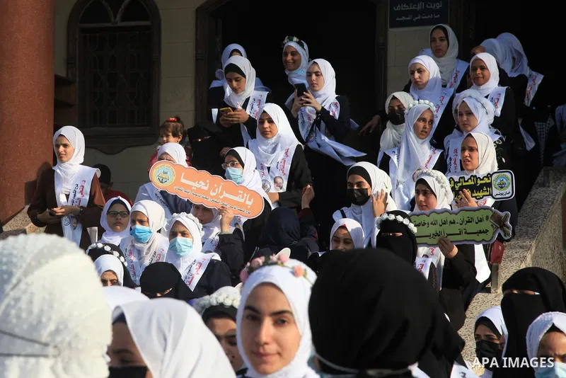 Palestinians participate in a ceremony to honor the memorizers of the Holy Koran, in Gaza city on October 26, 2021. Photo by Omar Ashtawy