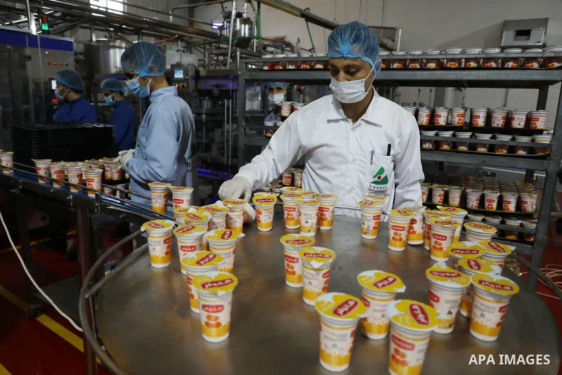 Palestinian employees work at Hanover factory for dairy, in Gaza city, on October 28, 2021. Photo by Majdy Fathi