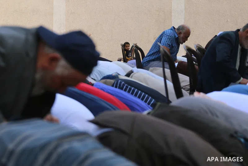 Palestinians pray for rain in Jabalia in the northern Gaza Strip on November 11, 2021. The special Muslim prayers known as Salat al-Istisqa, it is a ritual practiced since the time of the Prophet Mohammed, are frequently...