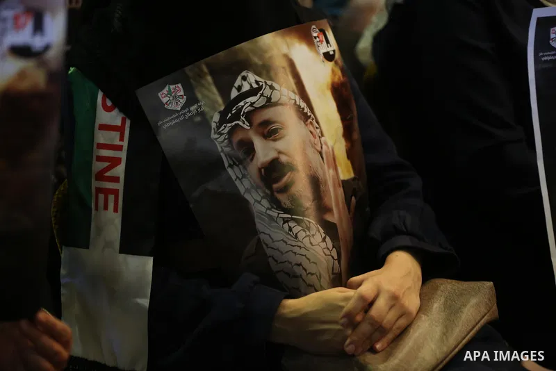 Palestinians take part in a ceremony to mark the 17th anniversary of death of late president Yasser Arafat, in Gaza city on November 11, 2021. Photo by Ashraf Amra