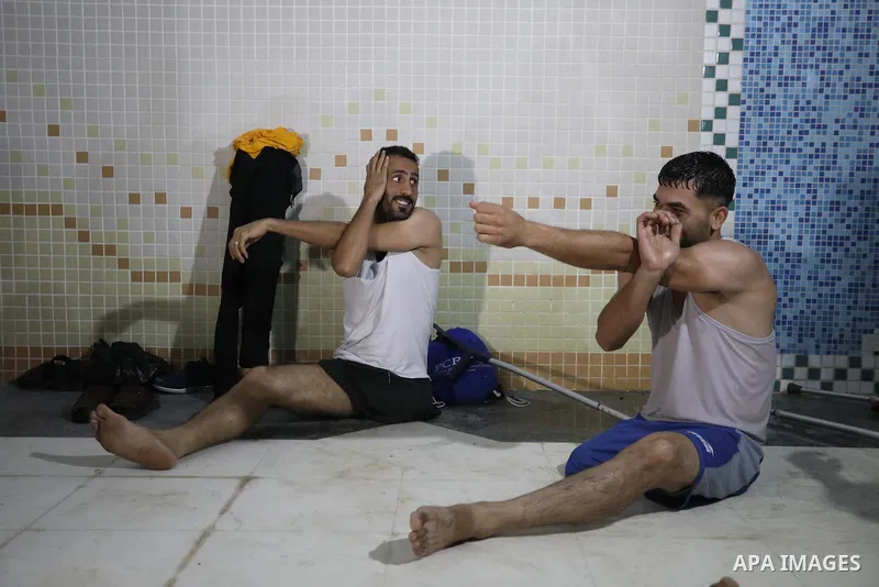 Palestinian amputees take part in a swimming championship at al-Sadaka Club in Gaza City November 14, 2021. Almost 50,000 Palestinians are classified as "disabled" among the 2-million population of the blockaded Gaza Str...