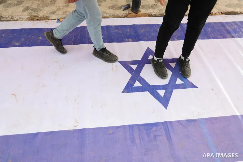 Palestinians attend the military and historical exhibition to mark the nine anniversary of Ahmed al-Jabari death, the late leader of Ezzedine al-Qassam Brigades, the armed wing of the Palestinian Hamas movement in Gaza C...