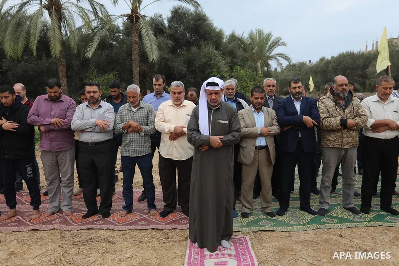 Palestinians take part in absentee funeral prayer of prisoner Sami al-Amour who dead in Israeli Jails as a result of intentional medical negligence, in Deir al-Balah in the center of Gaza strip on November 18, 2021. The...