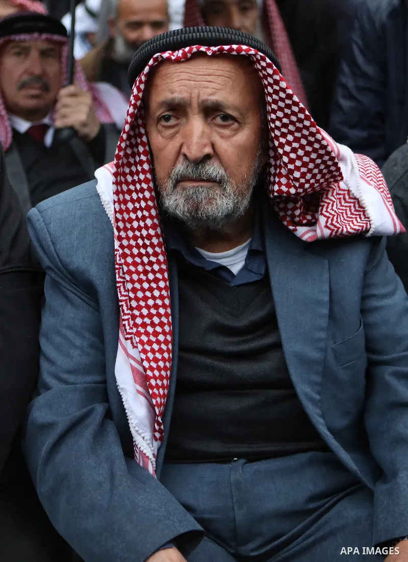 Palestinian supporters of Hizb ut-Tahrir or the Islamic Liberation Party of the Islamic Liberation Party take part in a protest against recent family quarrels in the West Bank town of Hebron, on November 20, 2021. Hebron...
