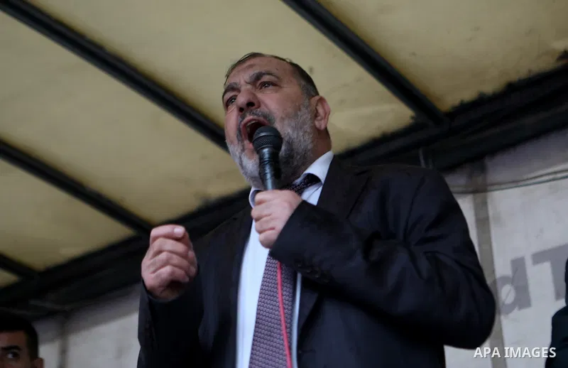 Palestinian supporters of Hizb ut-Tahrir or the Islamic Liberation Party of the Islamic Liberation Party take part in a protest against recent family quarrels in the West Bank town of Hebron, on November 20, 2021. Hebron...
