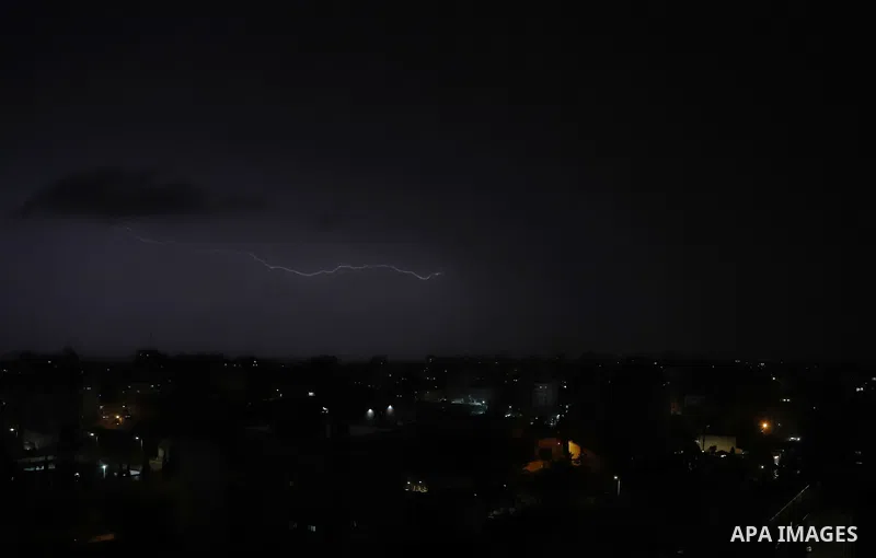 Lightning strikes is seen in the sky over Gaza city during a rainstorm on November 20, 2021. Photo by Omar Ashtawy