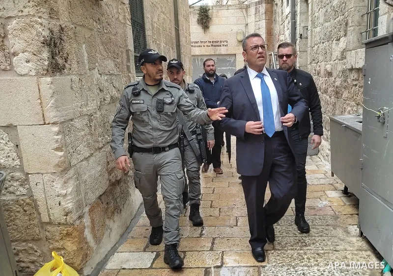 Israeli border guards stand guard behind a security perimeter at the scene of a shooting in the old city of Jerusalem on November 21, 2021. At least four people were wounded early on November 21, including two seriously,...