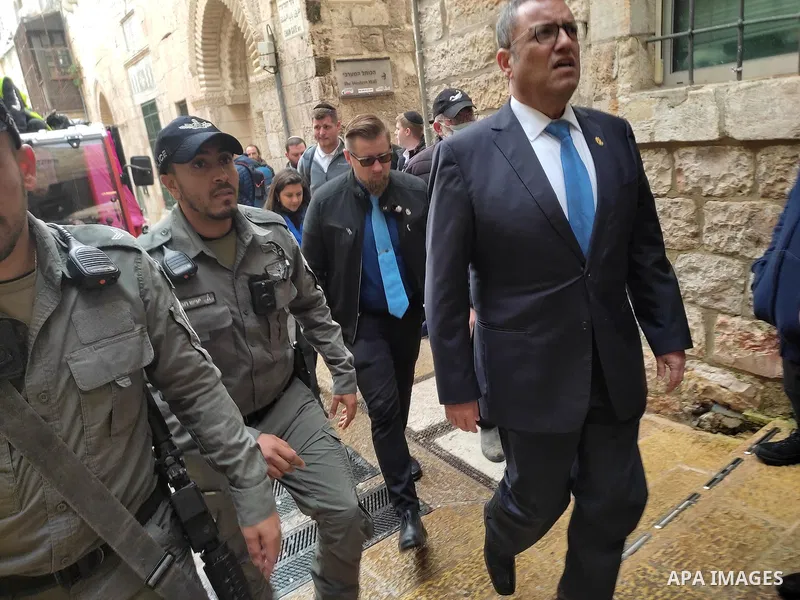 Israeli border guards stand guard behind a security perimeter at the scene of a shooting in the old city of Jerusalem on November 21, 2021. At least four people were wounded early on November 21, including two seriously,...