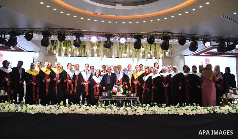 Palestinian Prime Minister Mohammed Ishtayeh participates in the graduation ceremony of the first cohort of Nablus University for Vocational and Technical Education, in the West Bank city of Ramallah, on November 21, 202...
